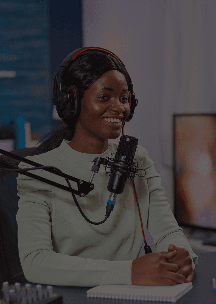 Creator recording a podcast in a studio